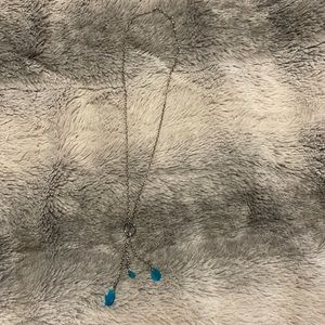 Silver necklace with blue jewels